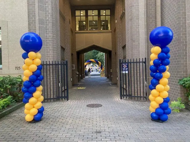 balloon columns blue and goldenrod with big 36 inch blue toppers