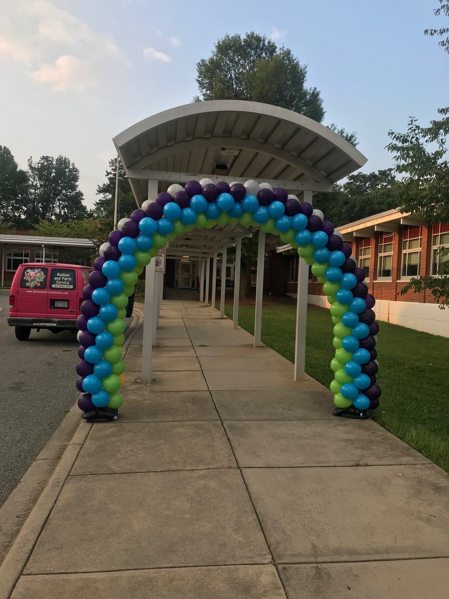 classic balloon arch lime green, purple, white and light blue