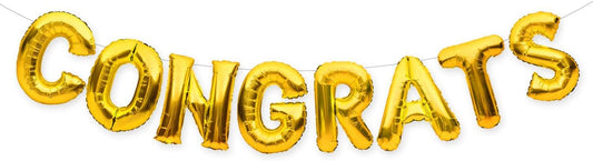 A gold-colored balloon banner made balloon letters that spell the word 'CONGRATS' .